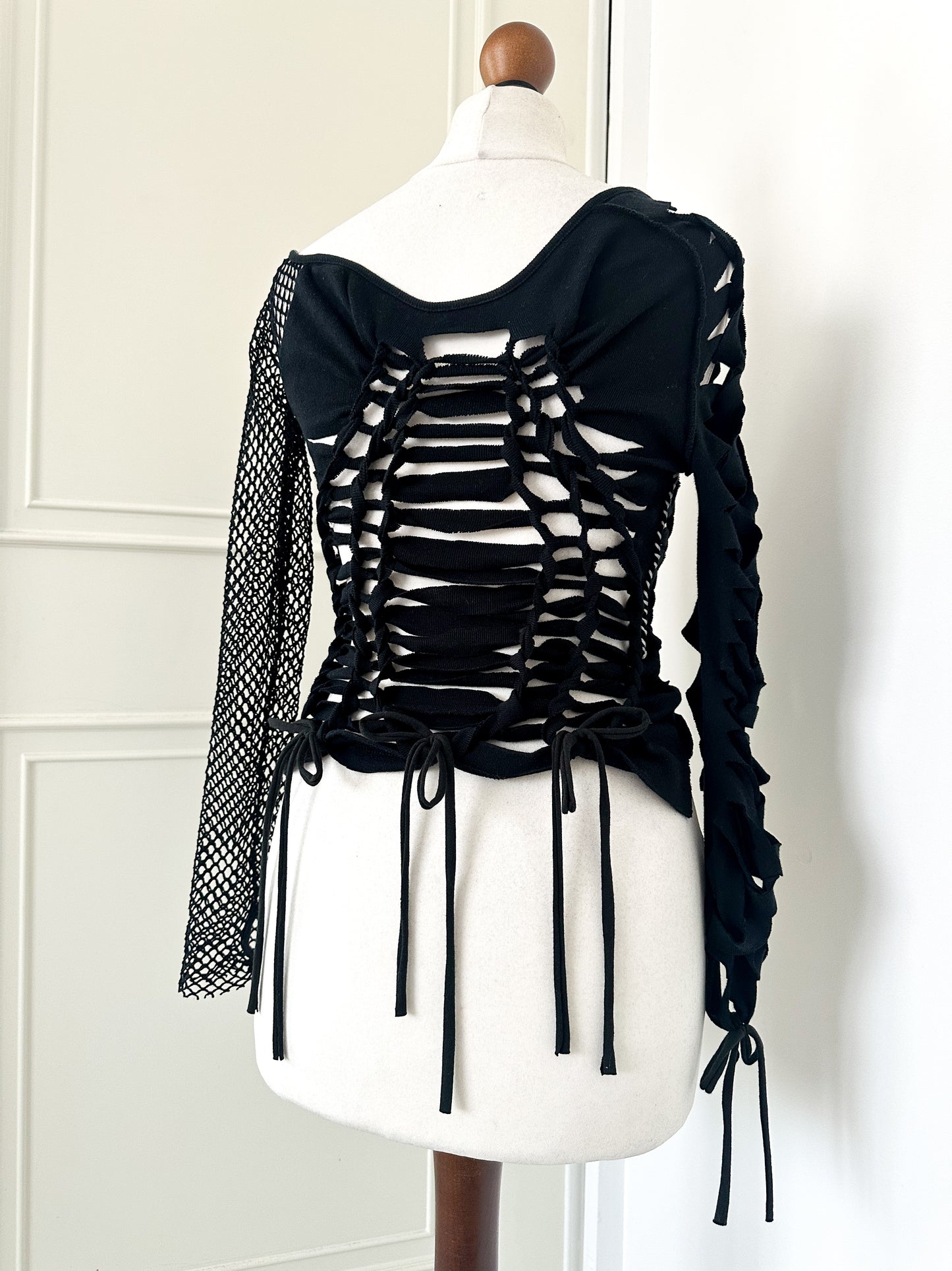 ‘Spider web’ asymmetrical long sleeve top